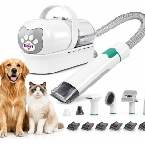 Kit de peluquería para perros y gatos con aspiradora integrada y accesorios de corte sobre fondo blanco.